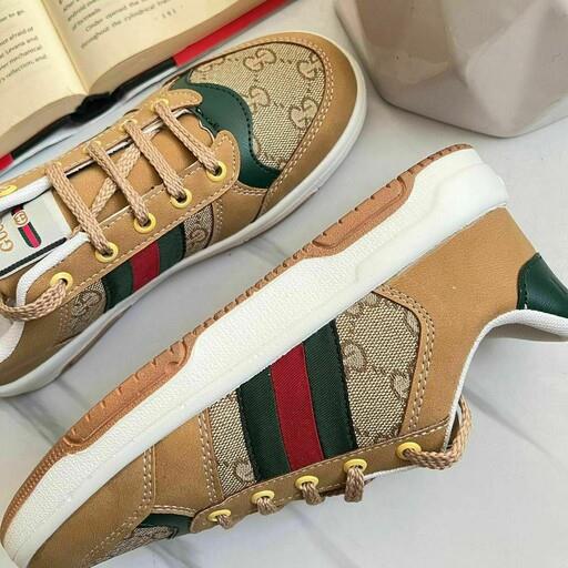 کتونی گوچی دخترانه زنانه ونس طرحدار GUCCI کفش اسپرت اسپورت طرح دار لژدار کرمی کرم مشکی سوییت چرم بندی سبک راحت طبی